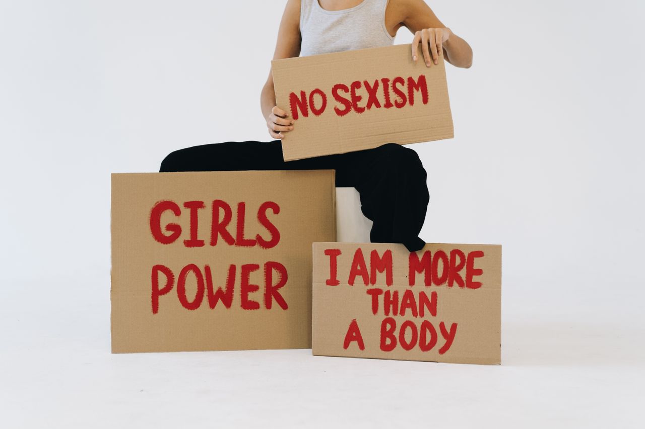 Studio shot of protest signs advocating women's empowerment and equality.